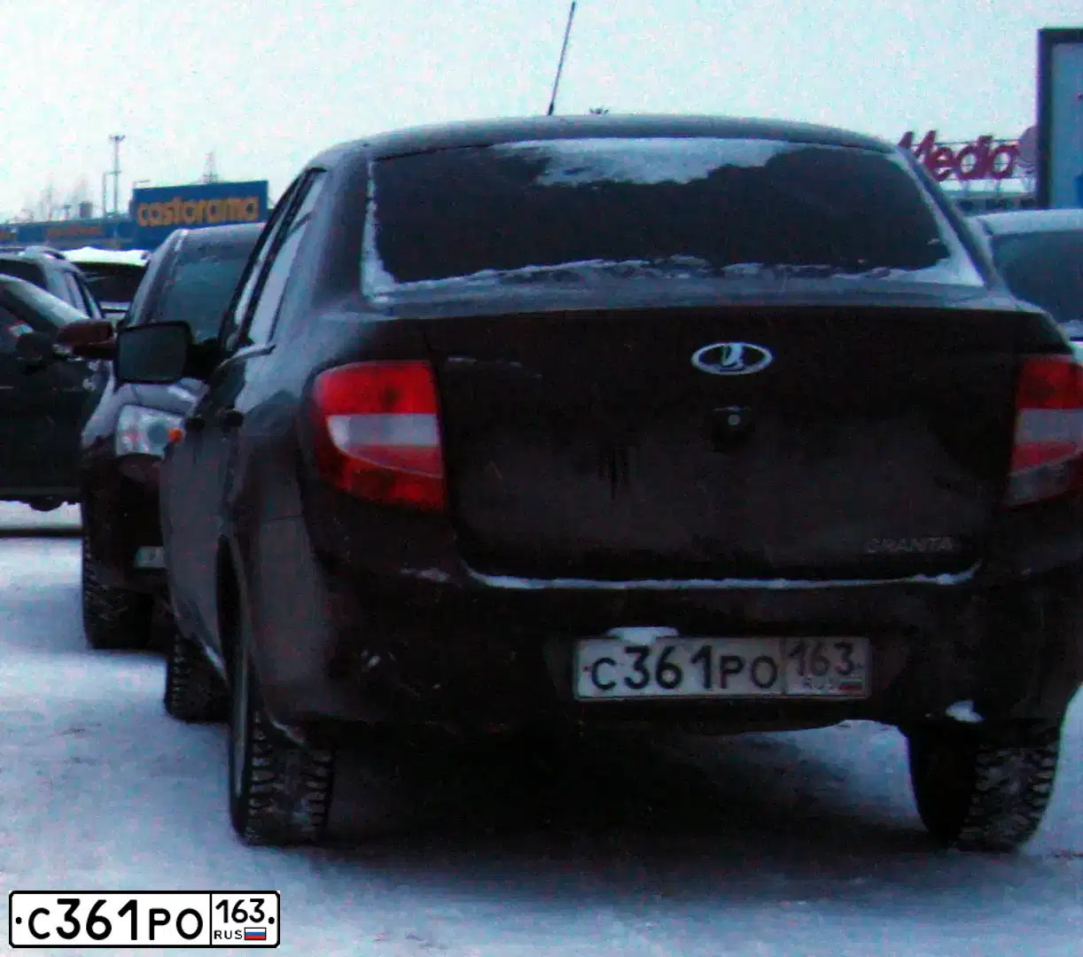 Фото автомобиля LADA GRANTA, 2013 — госномер О703СС193. Цвет: ТЕМНО-ВИШНЕВЫЙ