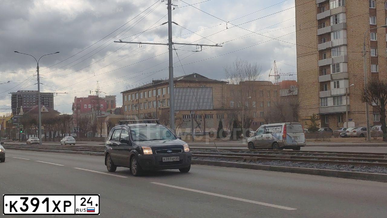 Фото автомобиля FORD FUSION, 2008 — госномер К391ХР24. Цвет: ЧЕРНЫЙ