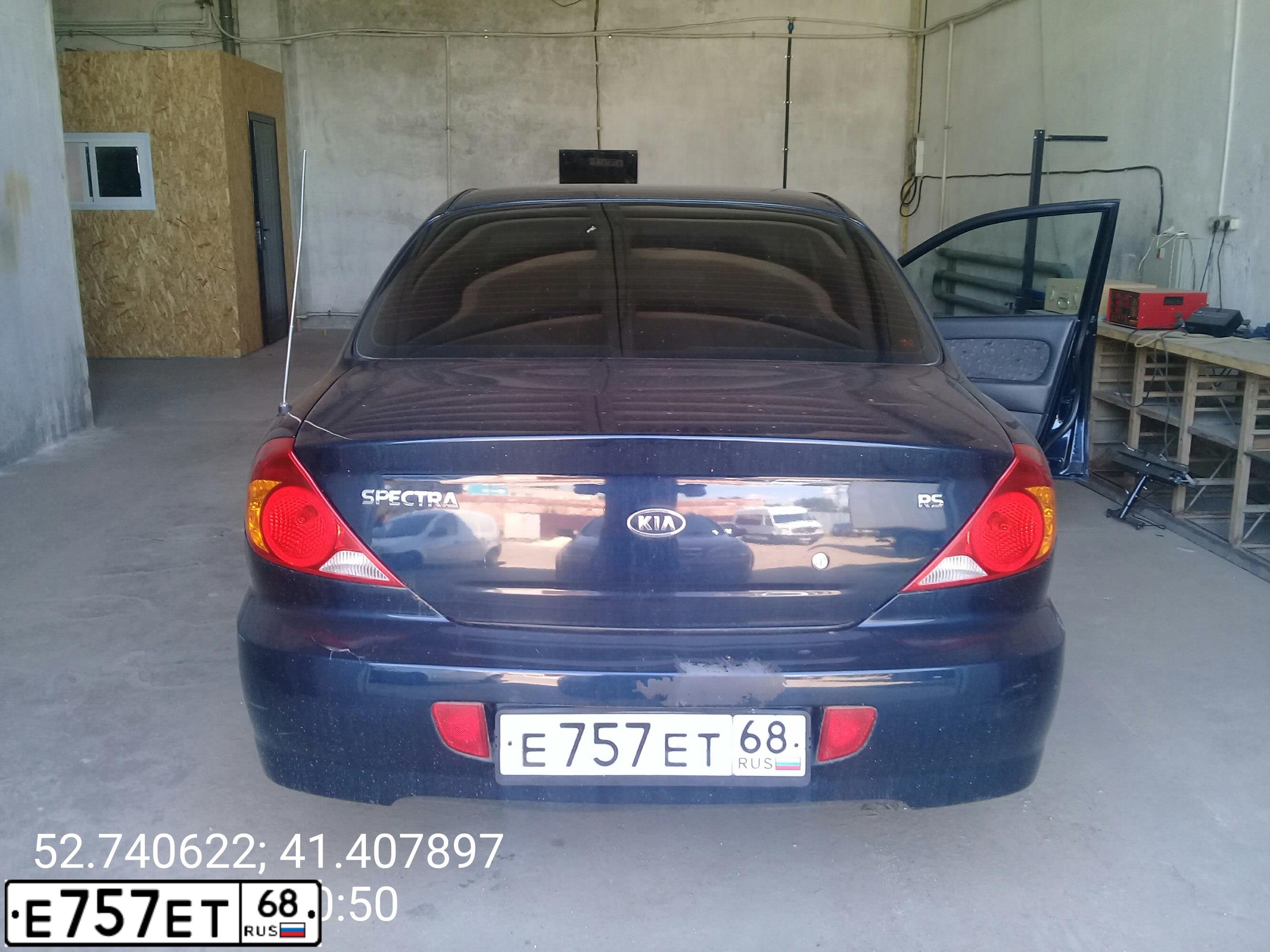 Фото автомобиля KIA SPECTRA, 2008 — госномер О411УТ68. Цвет: Темно-синий