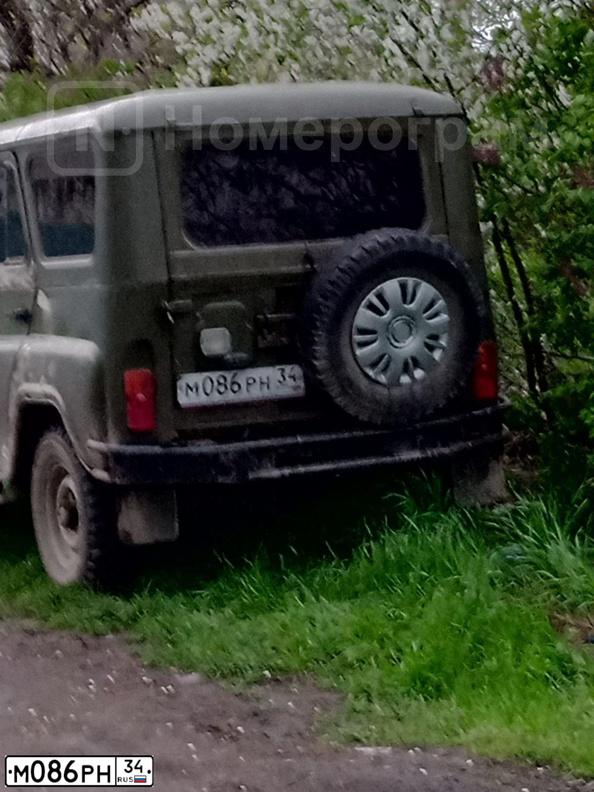 Фото автомобиля UAZ 3151 / HUNTER, 1996 — госномер М086РН34. Цвет: ЗЕЛЕНЫЙ