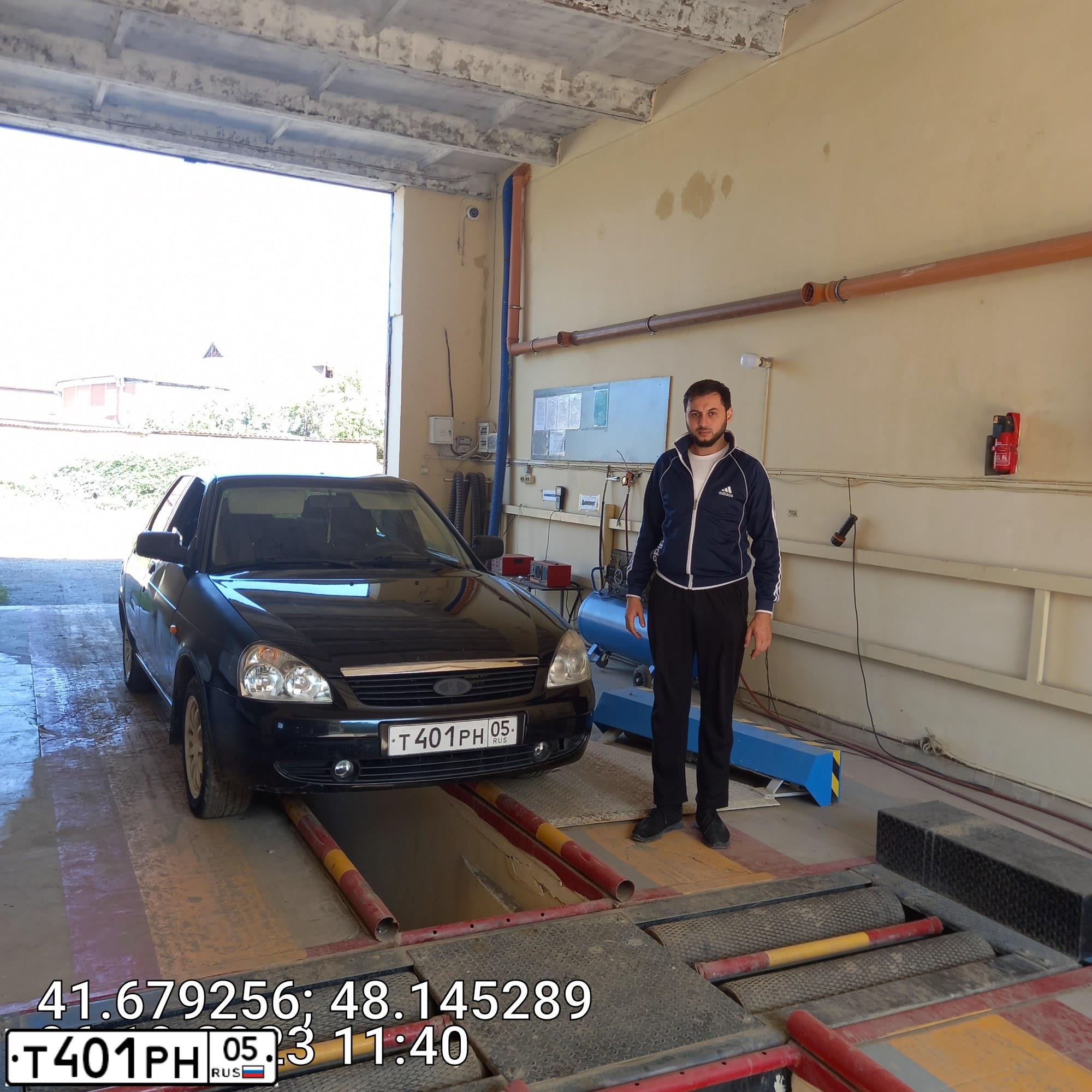 Фото автомобиля LADA 2170 PRIORA, 2010 — госномер Т401РН05. Цвет: ЧЕРНЫЙ