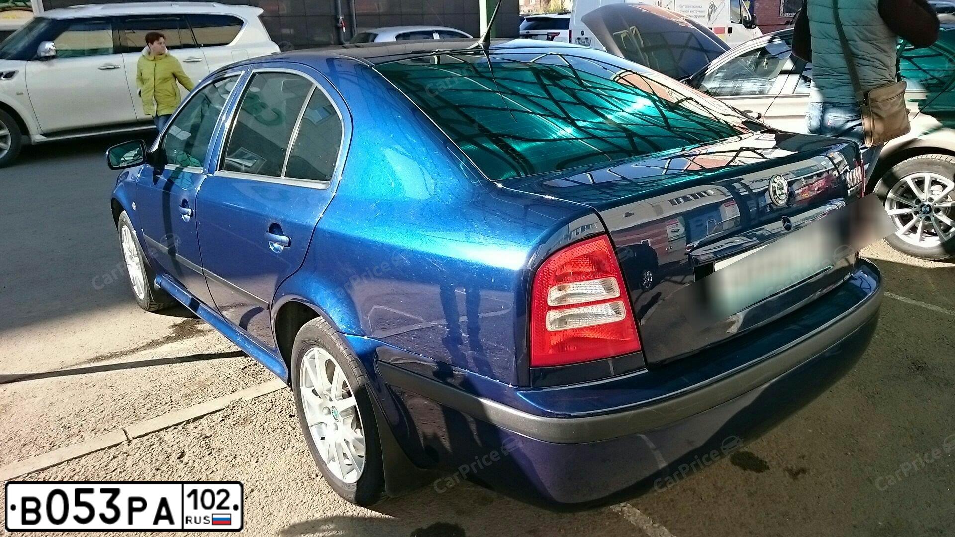Фото автомобиля SKODA OCTAVIA, 2009 — госномер Н930АВ702. Цвет: Темно-синий