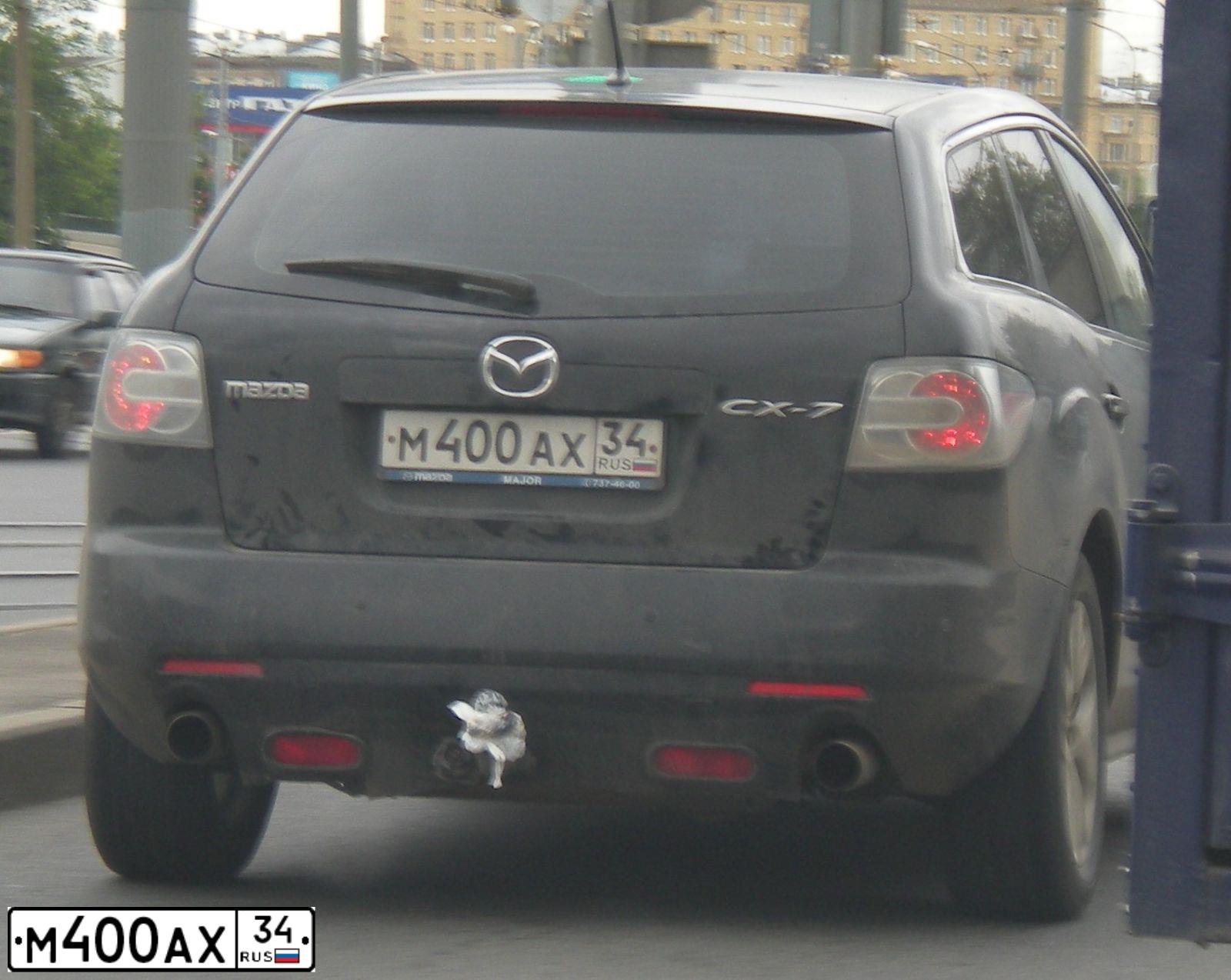 Фото автомобиля MAZDA CX-7, 2007 — госномер Р404ХТ799. Цвет: ЧЕРНЫЙ