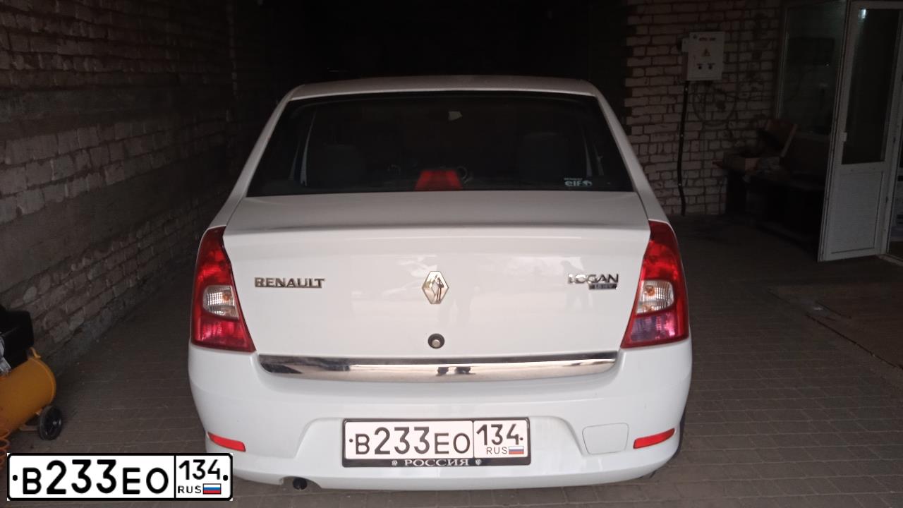 Фото автомобиля RENAULT LOGAN, 2014 — госномер В233ЕО134. Цвет: БЕЛЫЙ