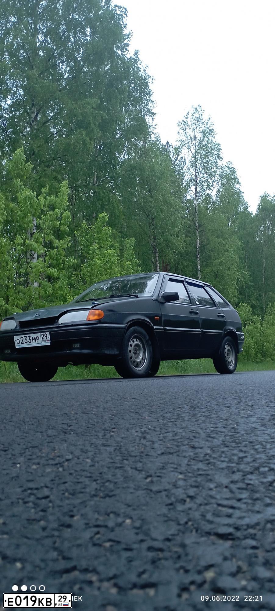 Фото автомобиля LADA 2114 SAMARA, 2006 — госномер О233МР29. Цвет: ЧЕРНЫЙ