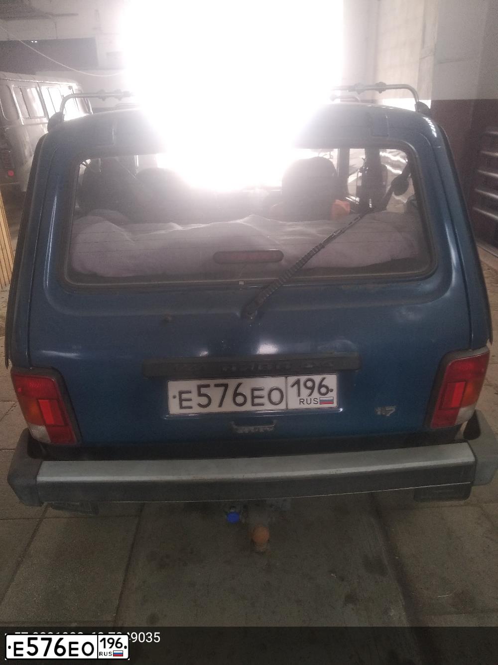 Фото автомобиля LADA 2121 NIVA, 2002 — госномер Е576ЕО196. Цвет: СИНЕ- ЗЕЛЕНЫЙ