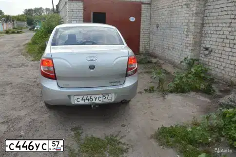Фото автомобиля LADA 2190 GRANTA, 2013 — госномер Н487УР46. Цвет: Серебристый