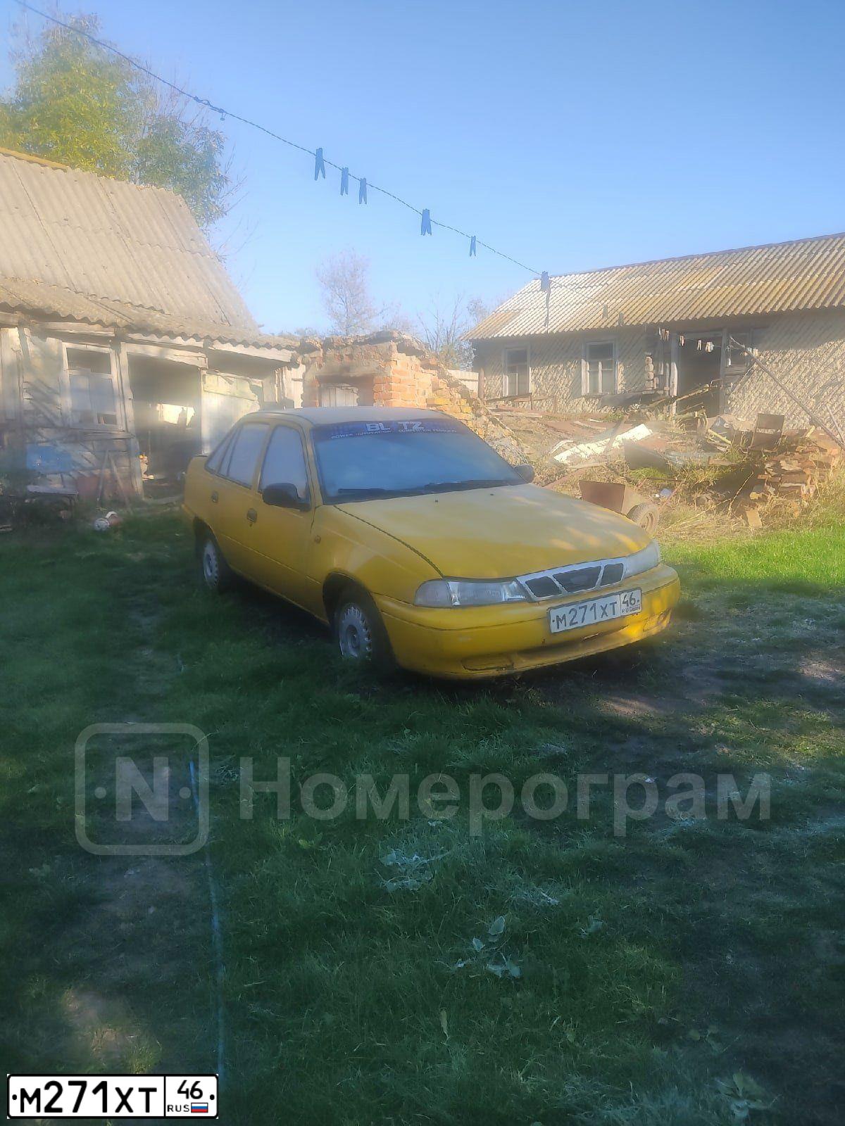 Фото автомобиля DAEWOO NEXIA, 2005 — госномер Р519АМ46. Цвет: ПЕСОЧНЫЙ