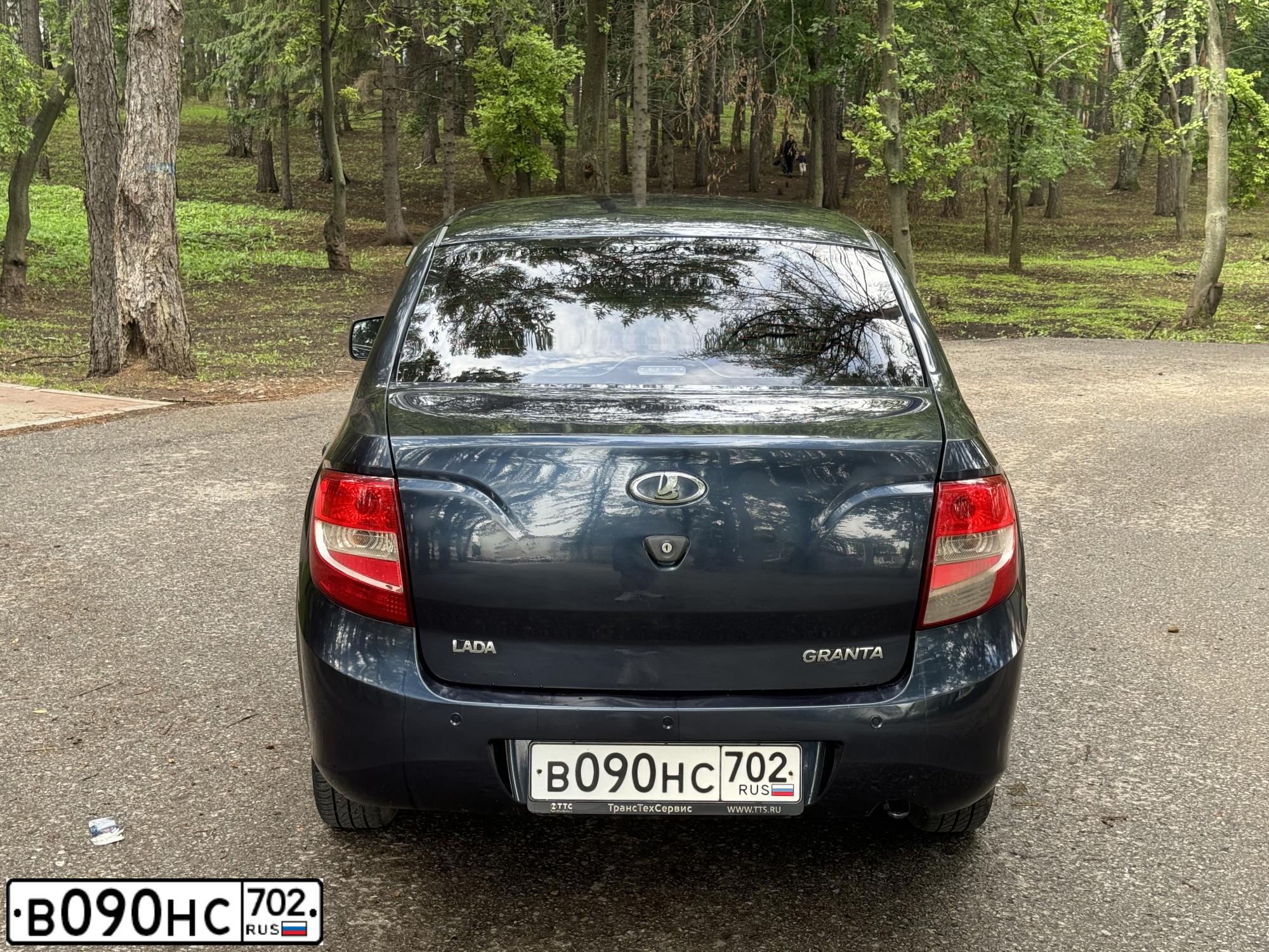 Фото автомобиля LADA 2190 GRANTA, 2012 — госномер В090НС702. Цвет: СЕРО-СИНИЙ