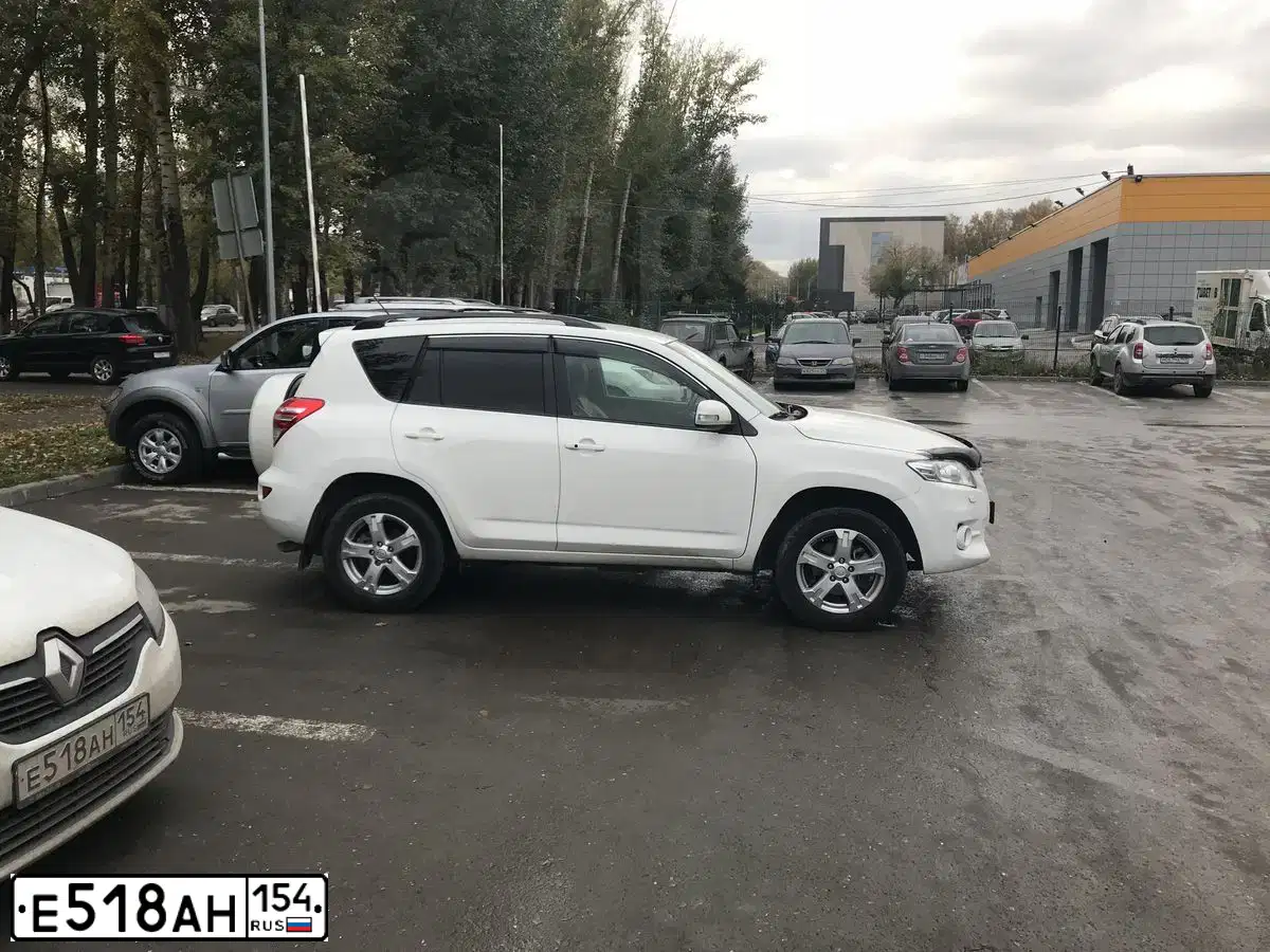 Фото автомобиля RENAULT LOGAN, 2014 — госномер Х470НМ62. Цвет: БЕЛЫЙ