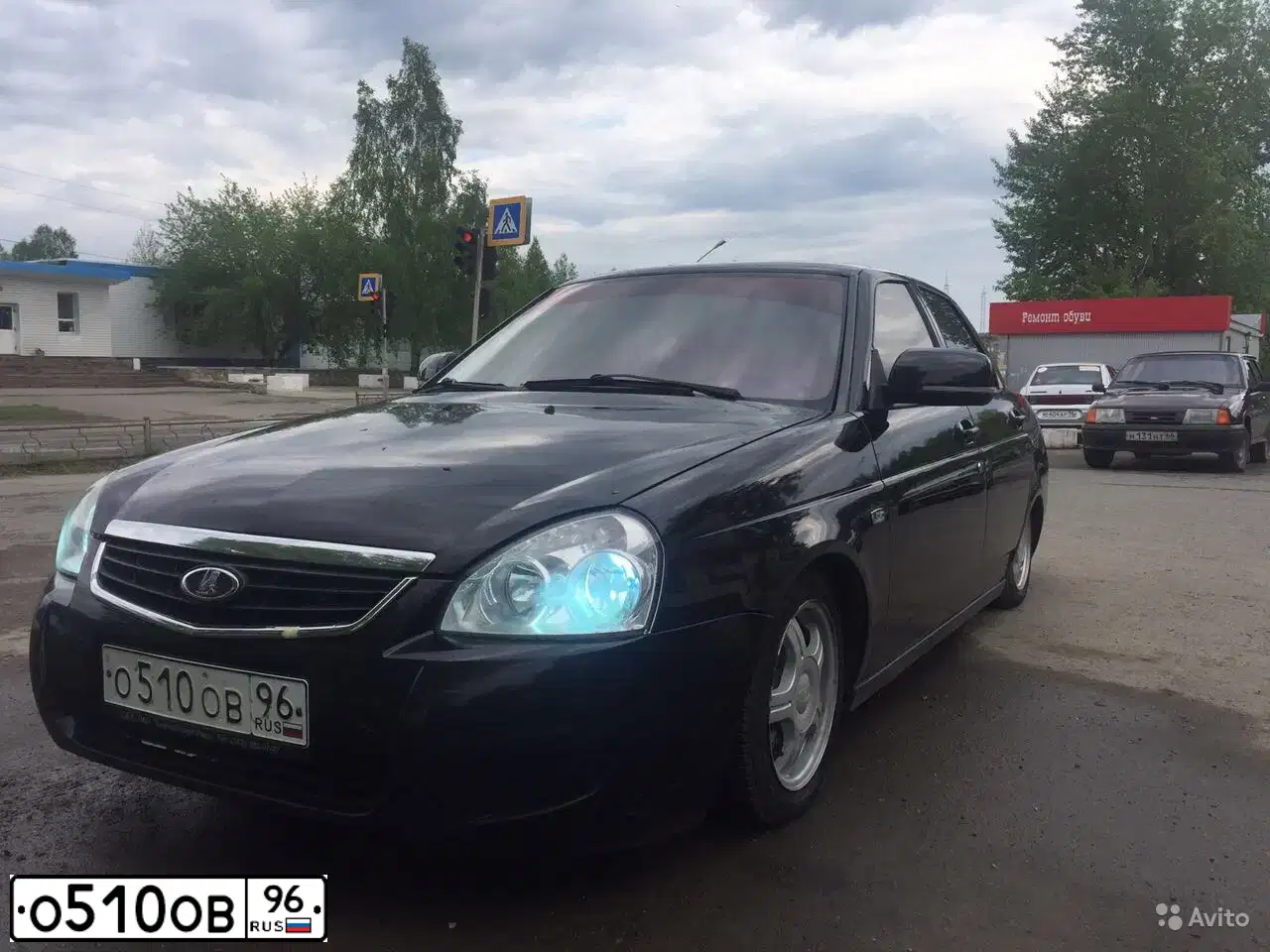 Фото автомобиля LADA PRIORA, 2009 — госномер Н601НТ702. Цвет: Сине-Черный