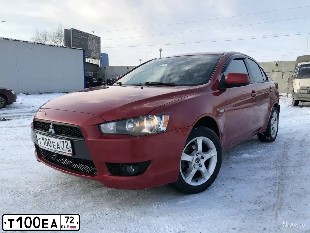 Фото автомобиля MITSUBISHI LANCER, 2007 — госномер Т334ХН72. Цвет: Красный