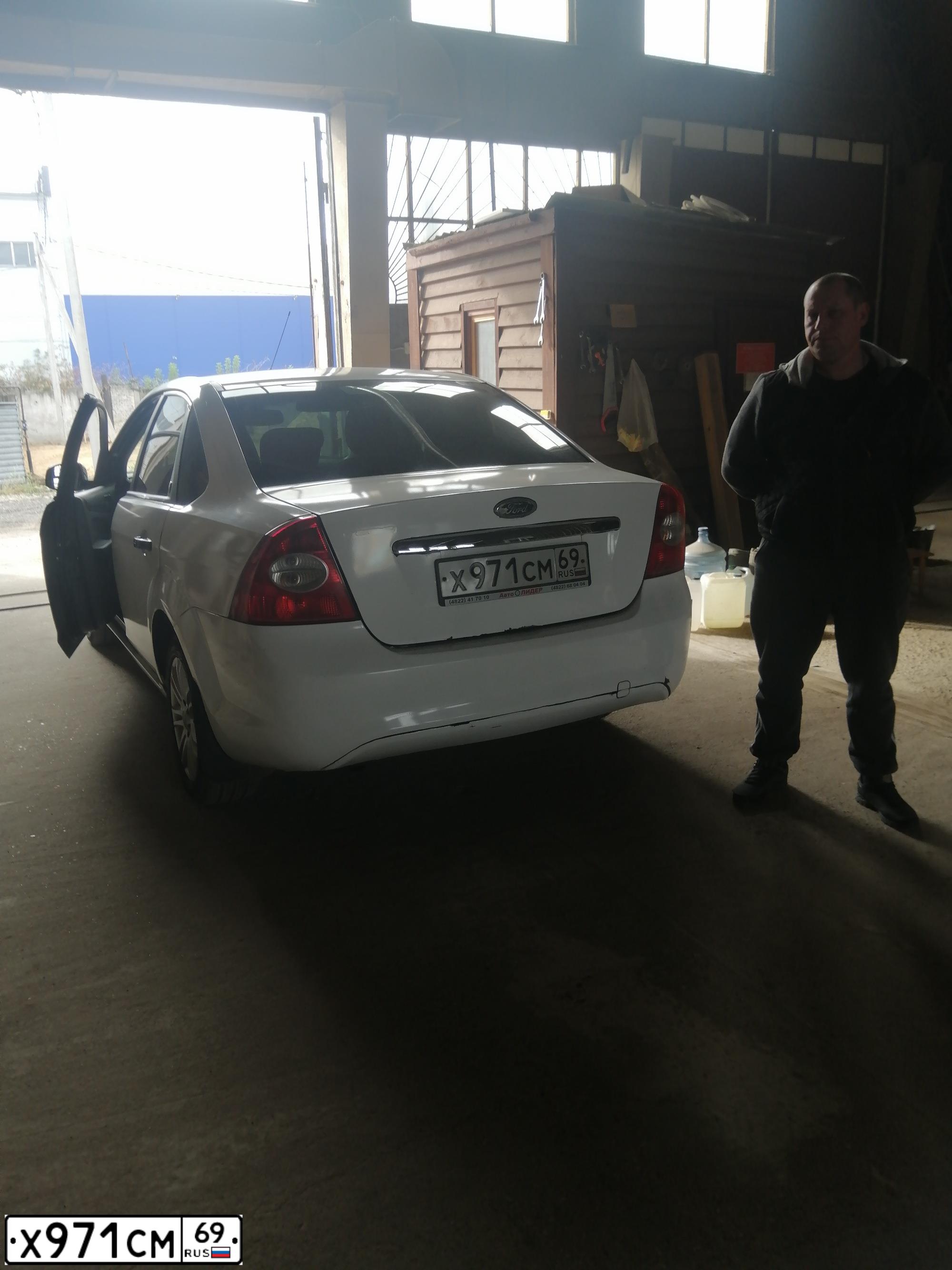 Фото автомобиля FORD FOCUS, 2008 — госномер Х971СМ69. Цвет: БЕЛЫЙ