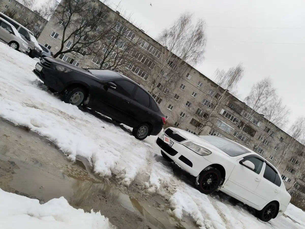 Фото автомобиля SKODA OCTAVIA, 2011 — госномер Е511ХК33