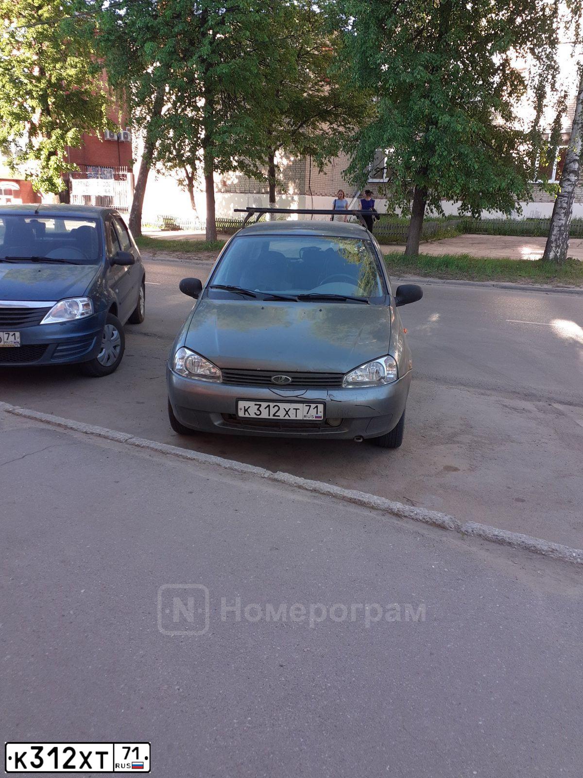 Фото автомобиля LADA 1117 KALINA, 2010 — госномер К312ХТ71. Цвет: ТЕМНО-СЕРЫЙ МЕТАЛЛИК