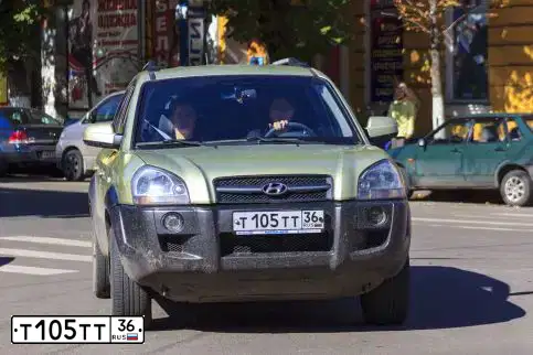 Фото автомобиля HYUNDAI TUCSON, 2005 — госномер Т105ТТ36. Цвет: СВЕТЛО-СЕРО-ЗЕЛЕНЫЙ