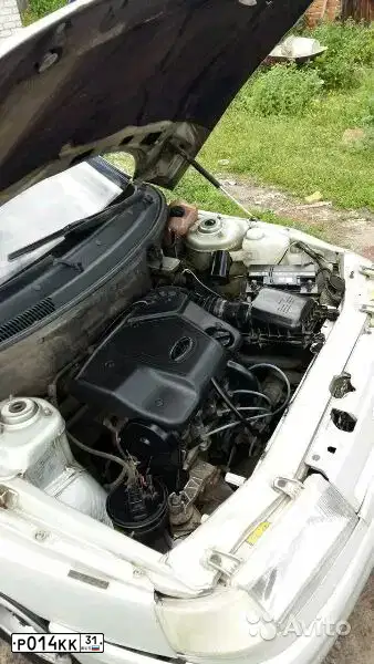 Фото автомобиля LADA 2110, 2005 — госномер Р014КК31. Цвет: МОЛОЧНО-БЕЛЫЙ