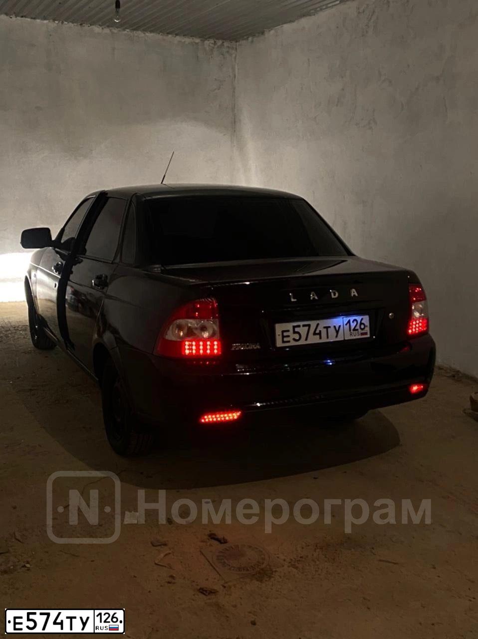 Фото автомобиля LADA PRIORA, 2014 — госномер С932УЕ05. Цвет: ЧЕРНЫЙ
