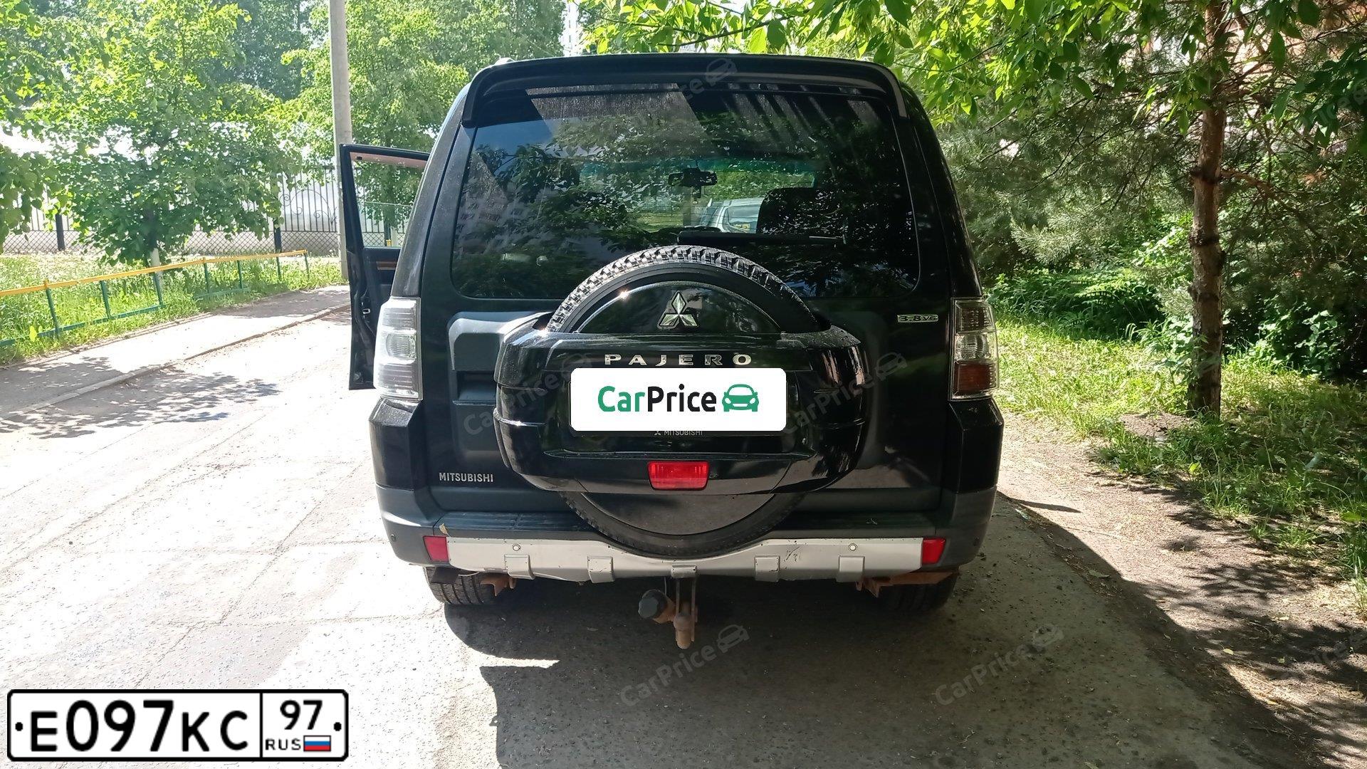 Фото автомобиля MITSUBISHI MONTERO, 2000 — госномер Е097КС97. Цвет: ЧЕРНЫЙ