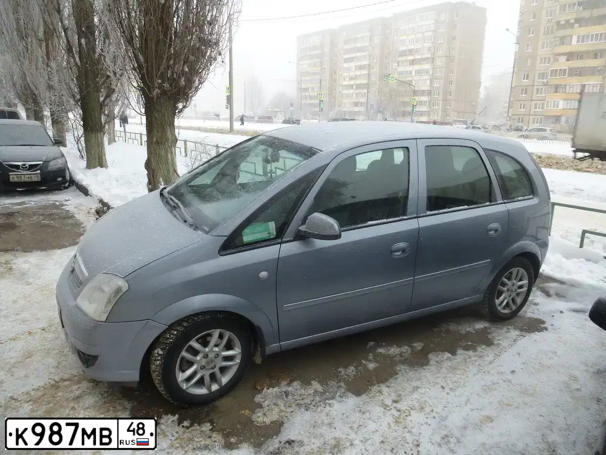 Фото автомобиля MAZDA 3, 2007 — госномер К987МВ48. Цвет: ЧЕРНЫЙ