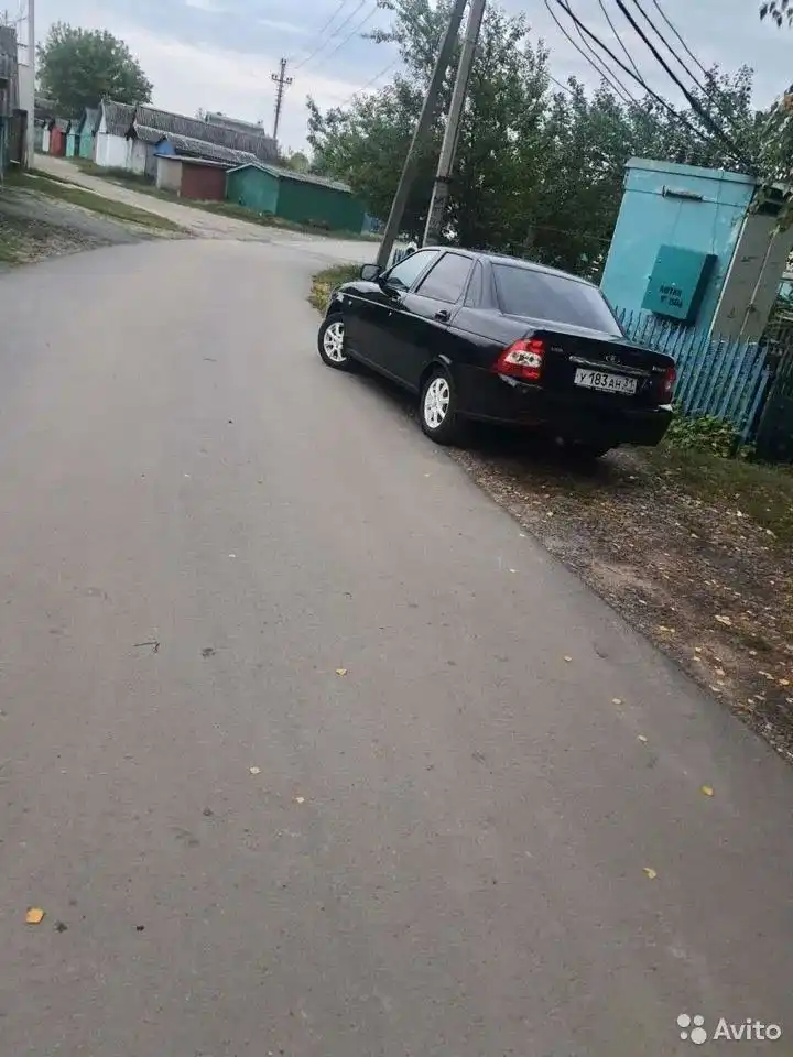 Фото автомобиля LADA 2170 PRIORA, 2012 — госномер У603СС31. Цвет: СИНЕ-ЧЕРНЫЙ