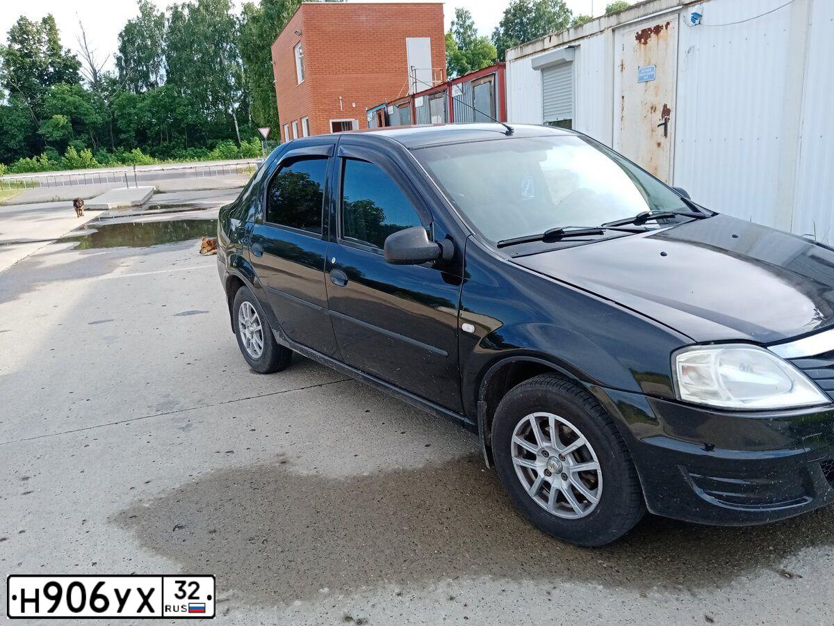 Фото автомобиля RENAULT LOGAN, 2010 — госномер О546ТМ69. Цвет: ЧЕРНЫЙ