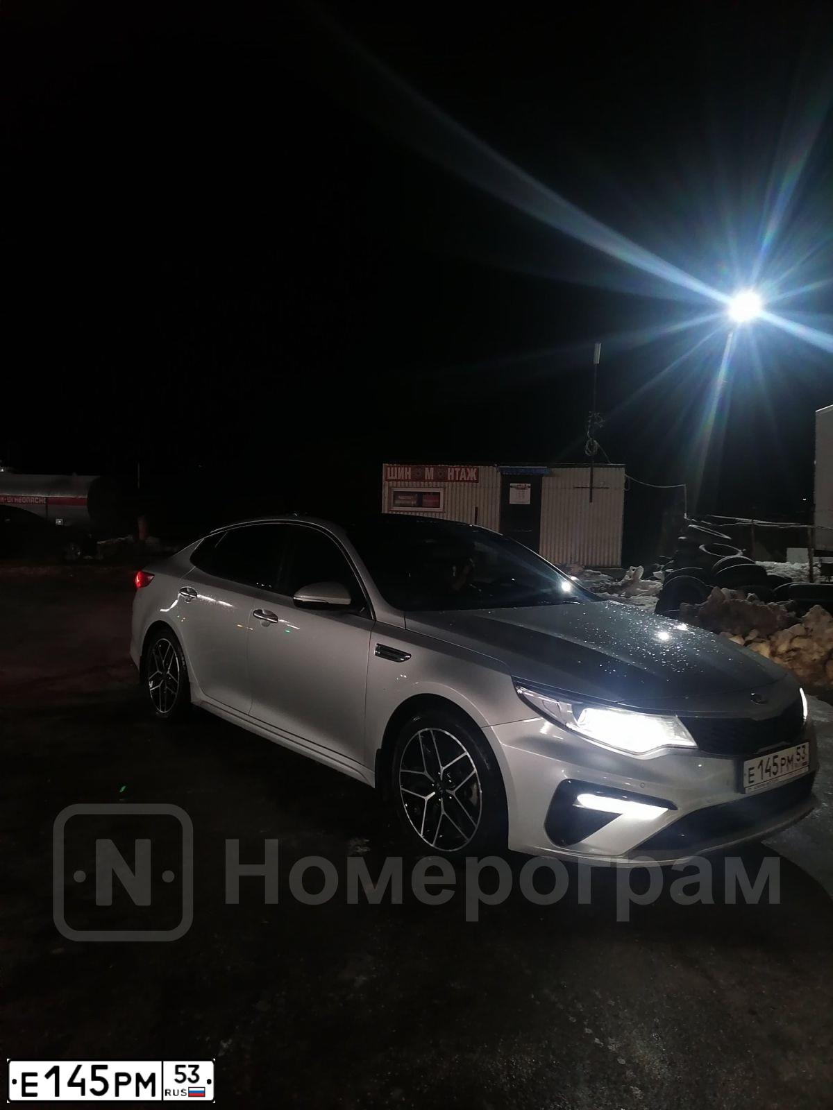 Фото автомобиля KIA MAGENTIS / OPTIMA, 2019 — госномер Е145РМ53. Цвет: Серебристый