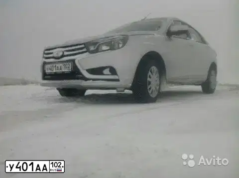 Фото автомобиля LADA VESTA, 2016 — госномер К311АС774. Цвет: Серебристый