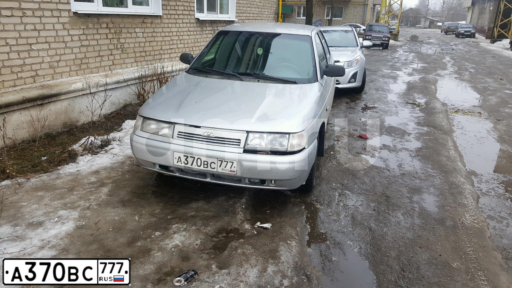 Фото автомобиля LADA 2112, 2007 — госномер Р180ХС150. Цвет: СЕРЫЙ