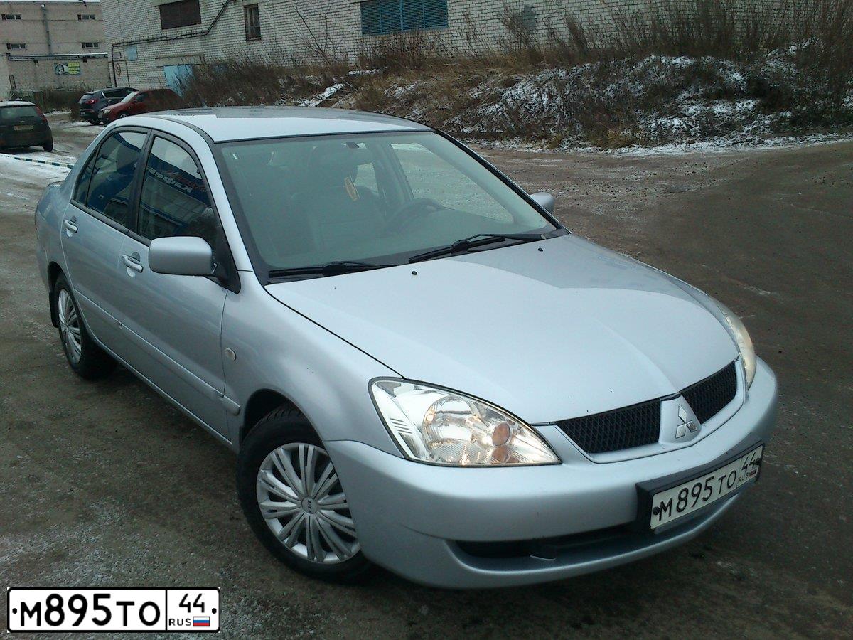 Фото автомобиля MITSUBISHI LANCER, 2005 — госномер С150АУ550. Цвет: СВЕТЛО-СЕРЫЙ