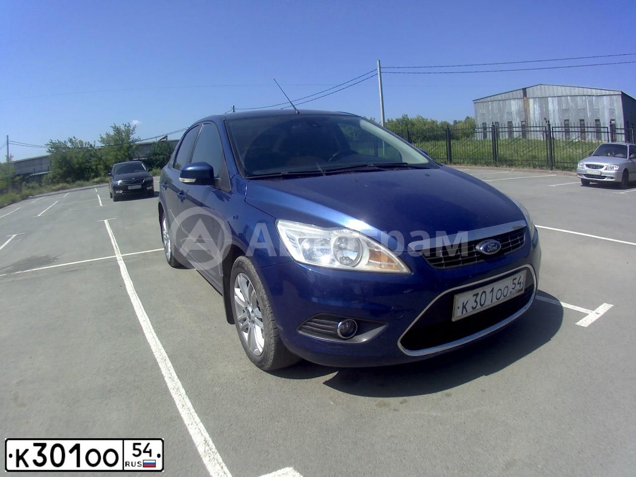 Фото автомобиля FORD FOCUS, 2008 — госномер К301ОО54. Цвет: СИНИЙ