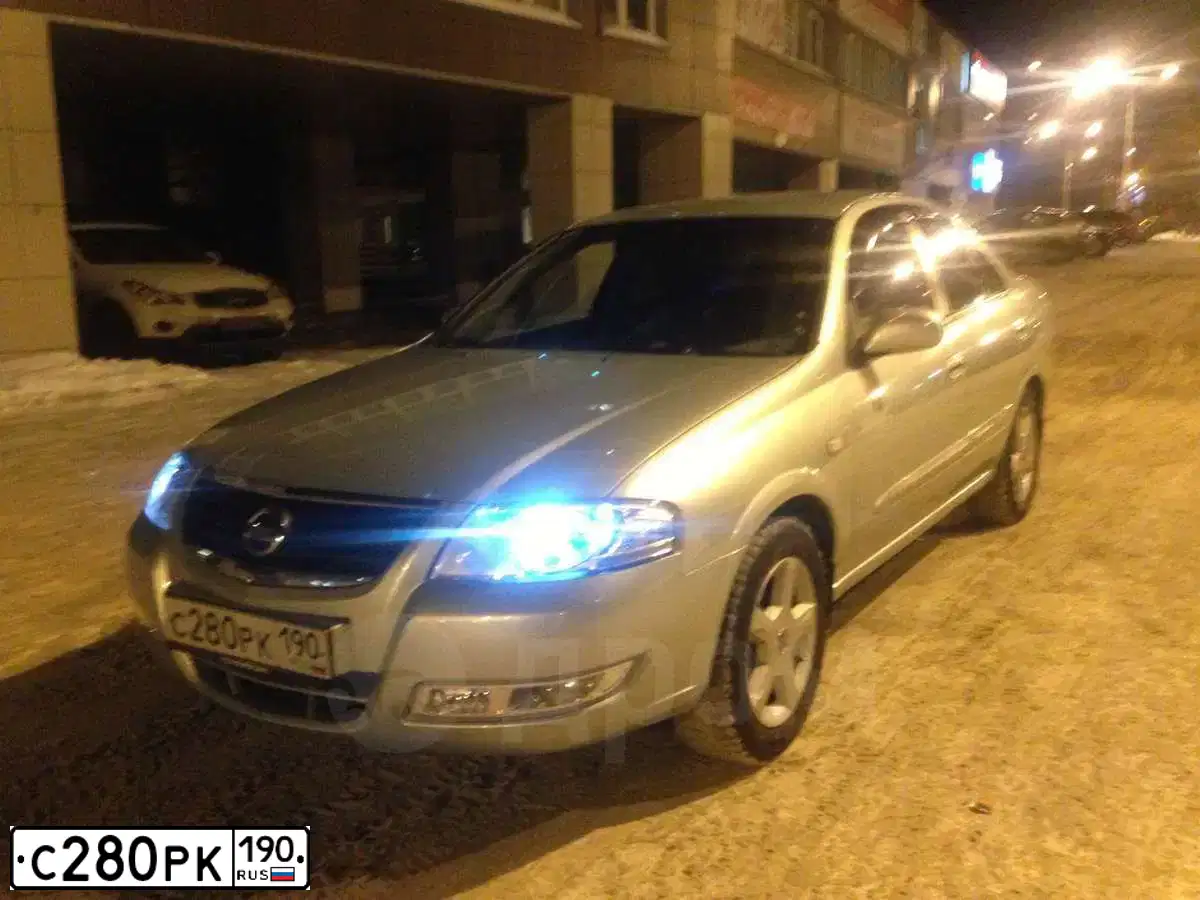 Фото автомобиля NISSAN ALMERA, 2006 — госномер Т981ЕН190. Цвет: СЕРЫЙ СВЕТЛЫЙ