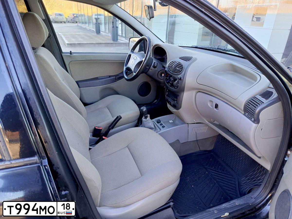 Фото автомобиля LADA 1119 KALINA, 2012 — госномер Т994МО18. Цвет: Сине-Черный