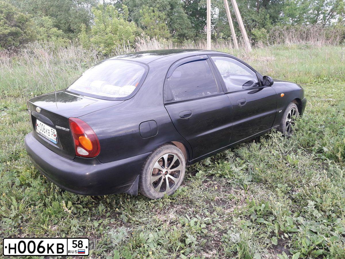 Фото автомобиля KIA RIO, 2015 — госномер Н006КВ58. Цвет: Белый