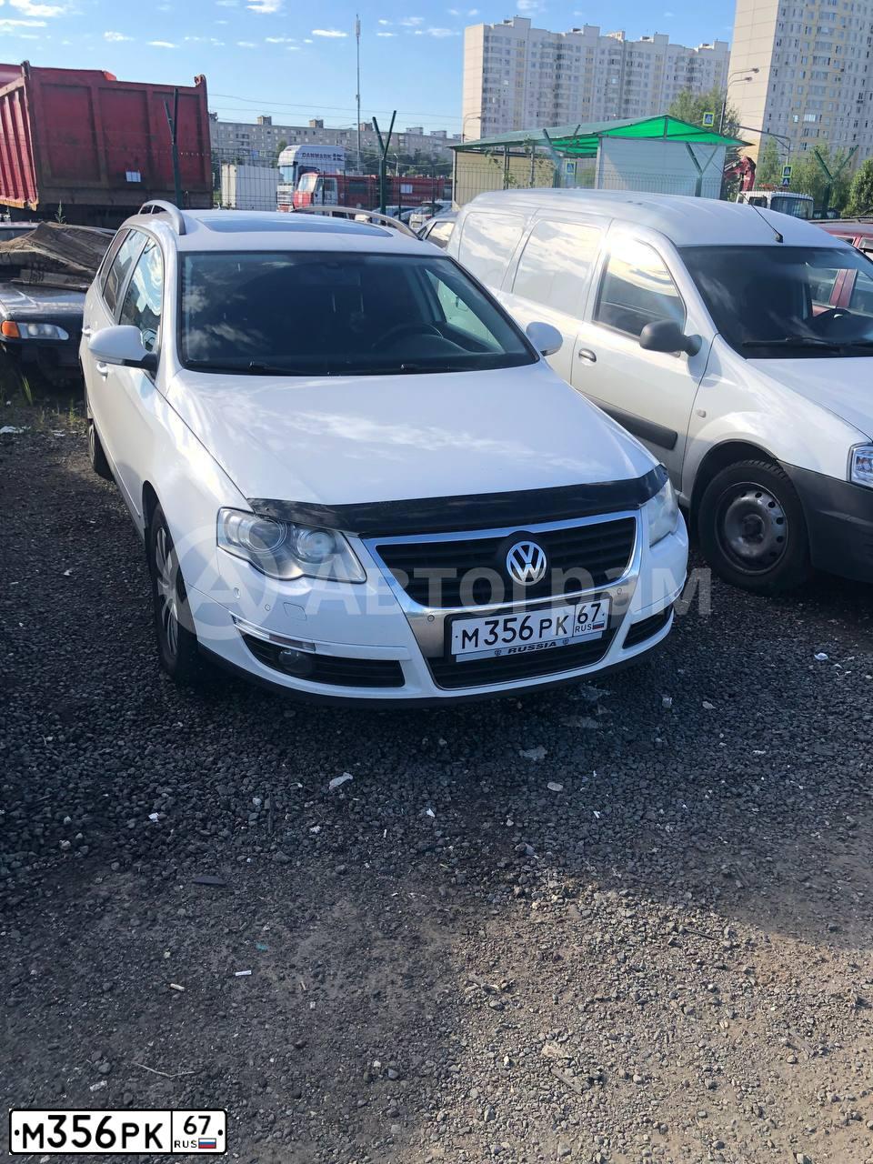 Фото автомобиля VOLKSWAGEN PASSAT, 2009 — госномер Т619СК77. Цвет: Белый