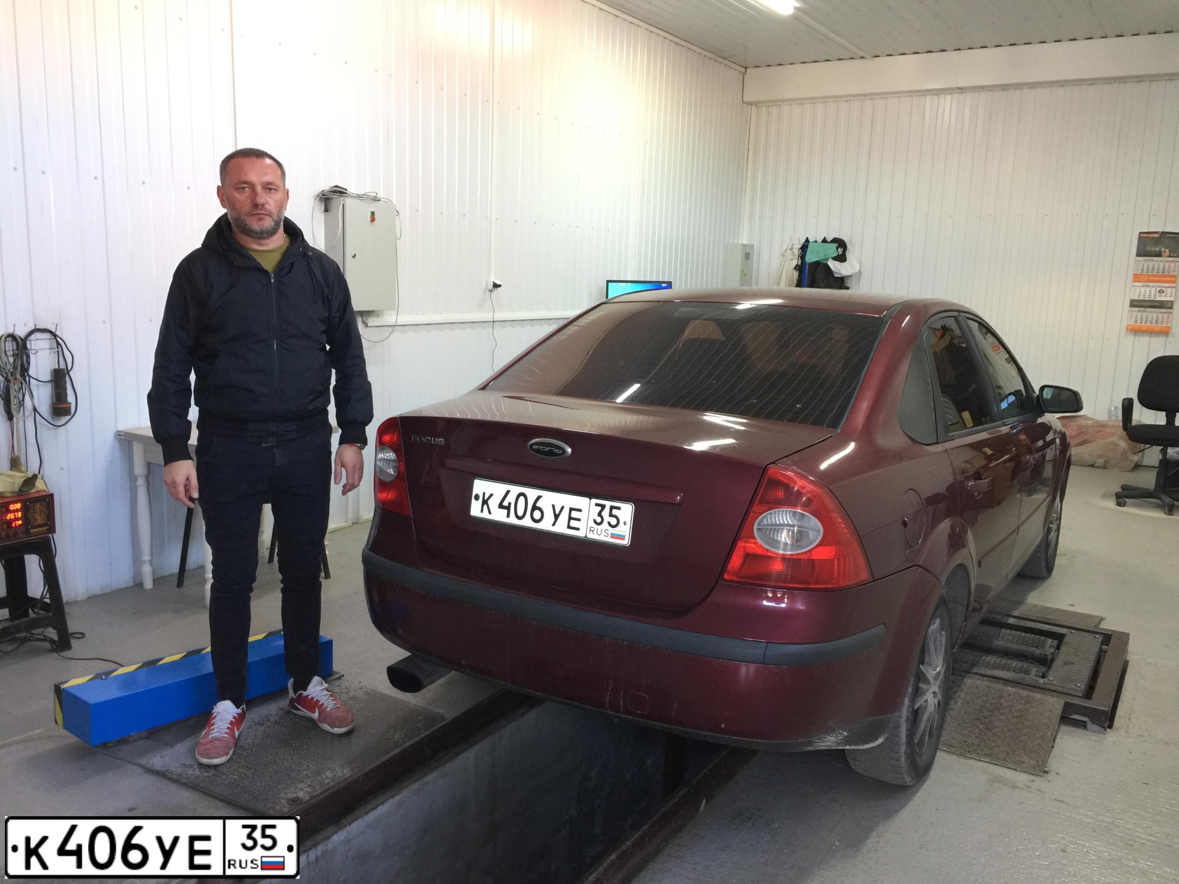 Фото автомобиля FORD FOCUS, 2006 — госномер Н970КО82. Цвет: ВИШНЕВЫЙ