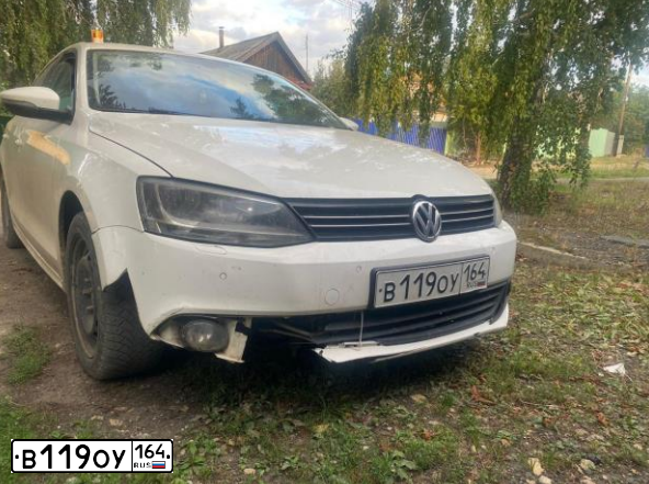 Фото автомобиля VOLKSWAGEN JETTA, 2011 — госномер В119ОУ164. Цвет: Белый