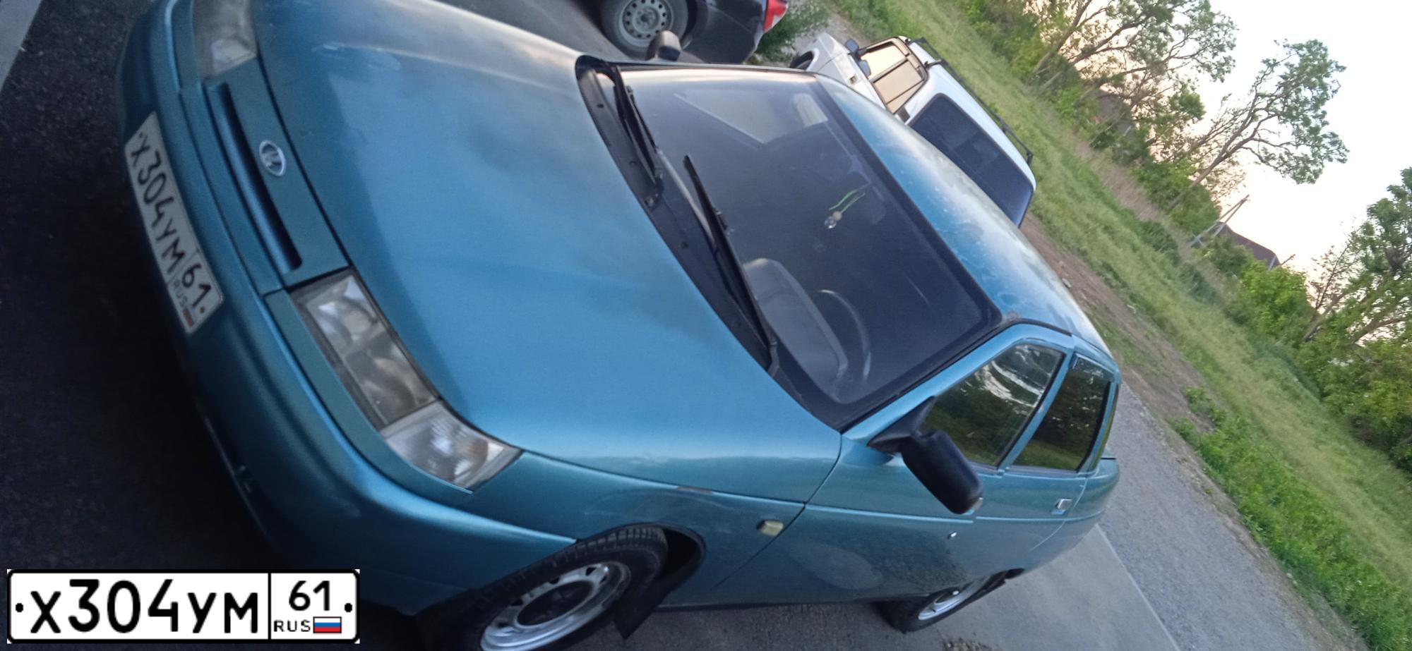 Фото автомобиля LADA 2110, 2000 — госномер Н032ХХ180