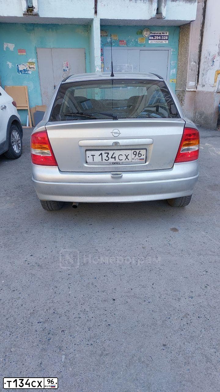 Фото автомобиля OPEL ASTRA, 2002 — госномер Т134СХ96. Цвет: СВЕТЛО-СЕРЫЙ