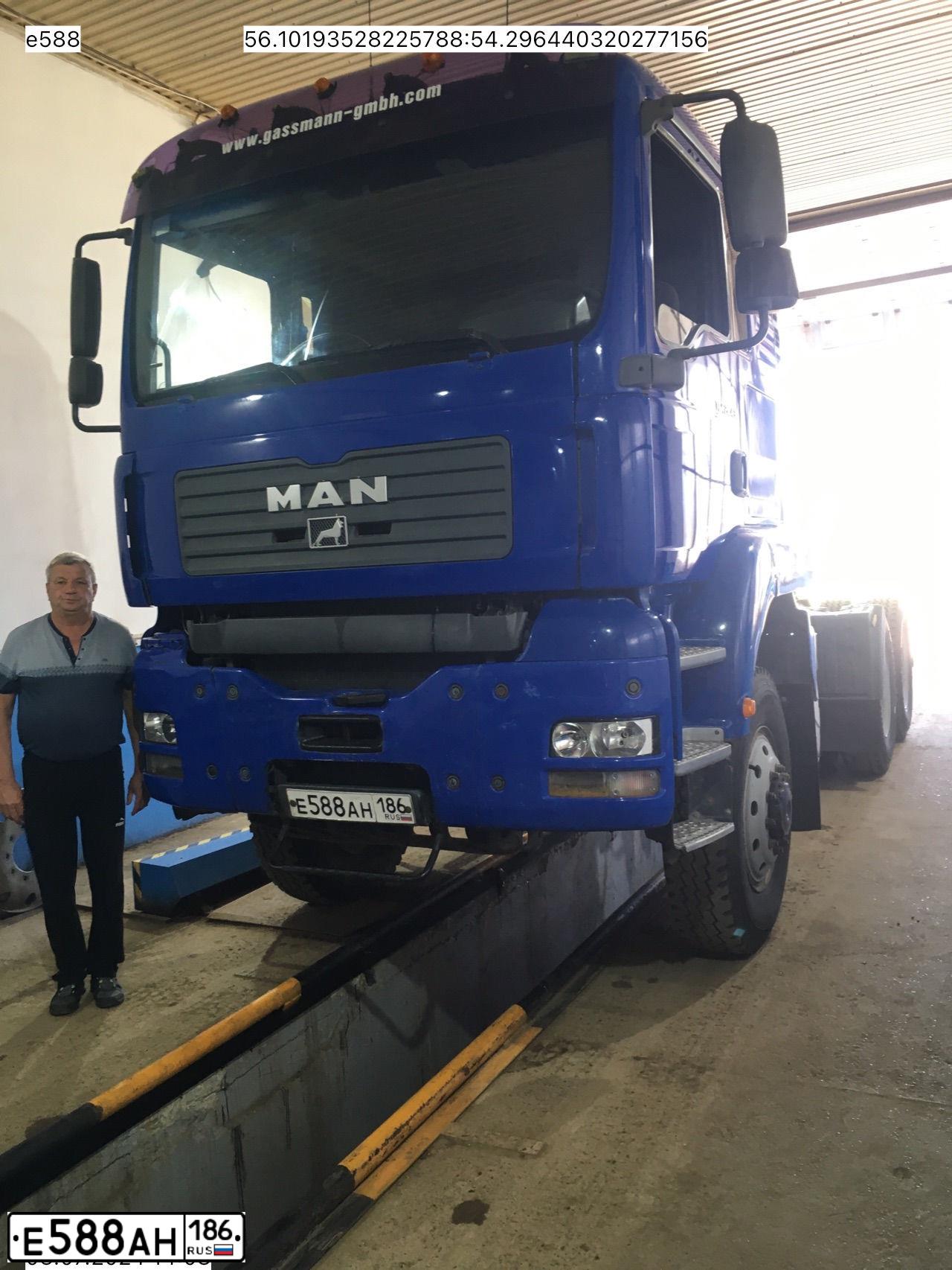 Фото автомобиля MAN TGA, 2005 — госномер Е588АН186. Цвет: синий