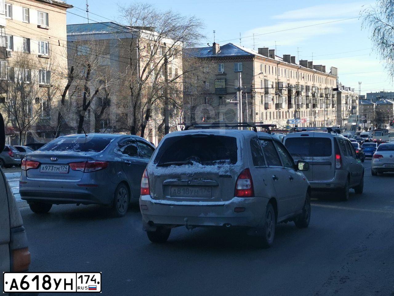 Фото автомобиля FORD FOCUS, 2011 — госномер А618УН174. Цвет: Белый