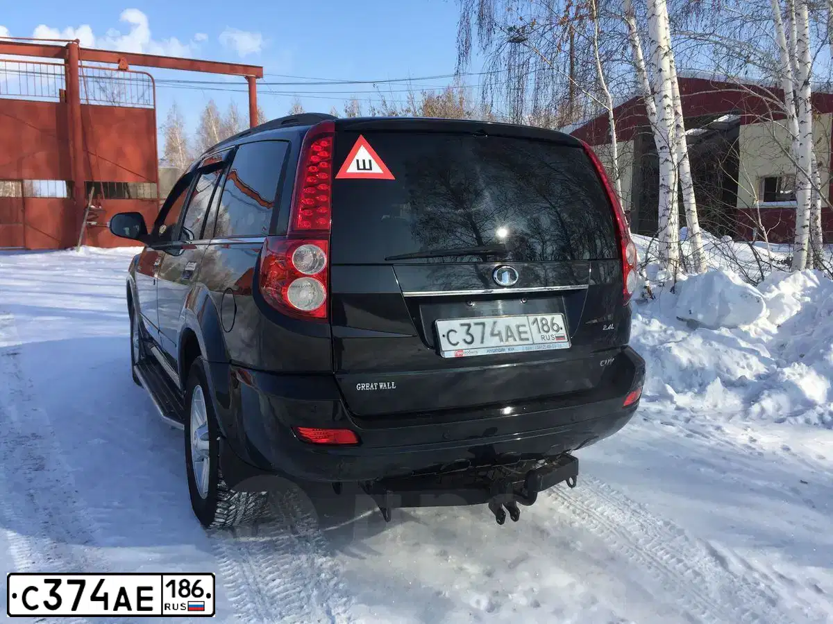 Фото автомобиля GREAT WALL HOVER, 2013 — госномер Н703КТ138. Цвет: ЧЕРНЫЙ