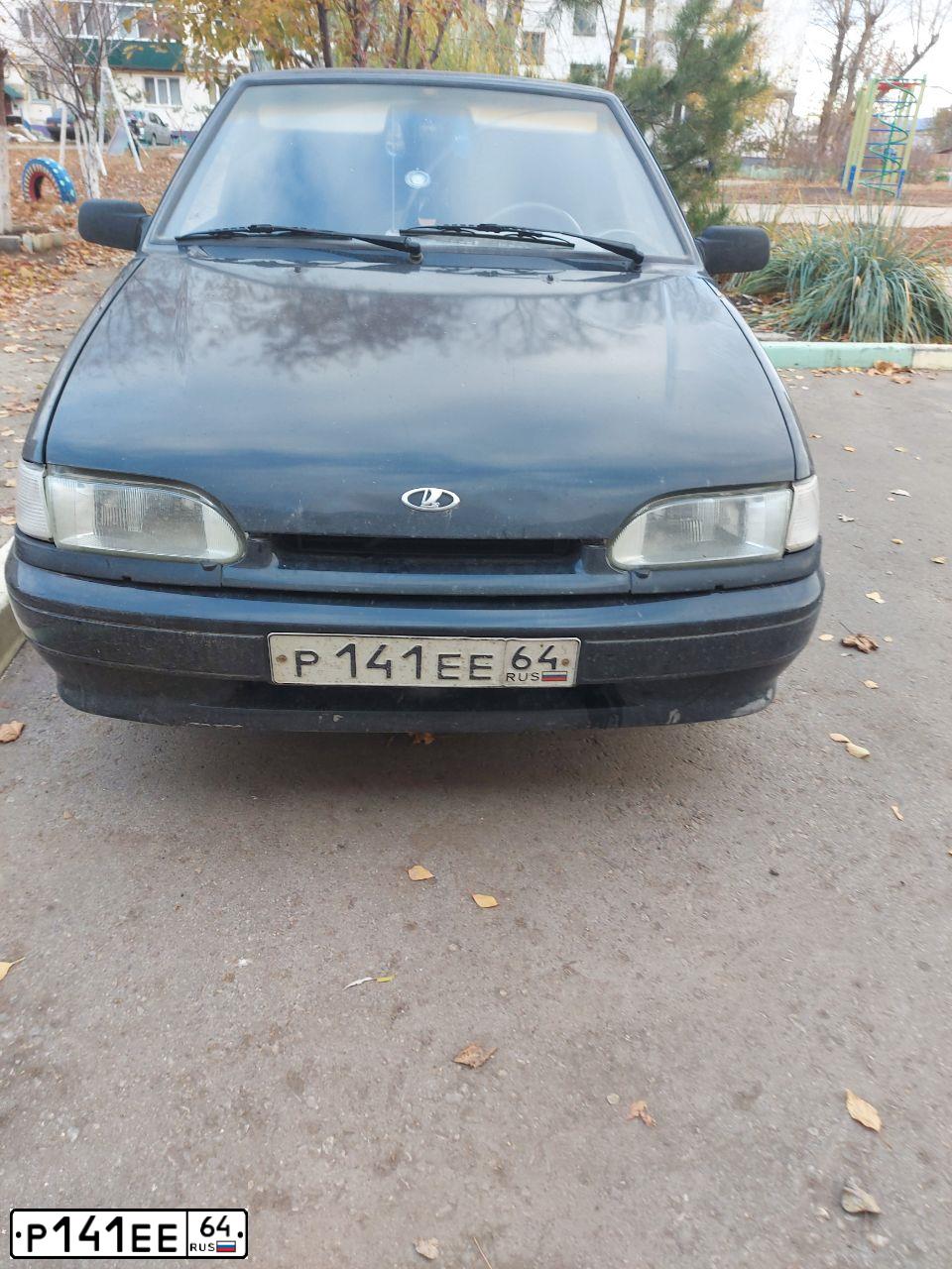 Фото автомобиля LADA 2114 SAMARA, 2008 — госномер Р141ЕЕ64. Цвет: ТЕМНО ЗЕЛЕНЫЙ
