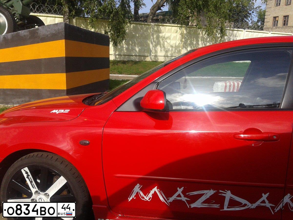 Фото автомобиля MAZDA 3, 2007 — госномер М159РУ134. Цвет: Красный