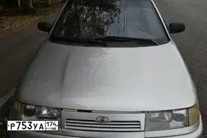 Фото автомобиля LADA 2112 LADA, 2007 — госномер В921КН702. Цвет: СВЕТЛО-СЕРЕБРИСТЫЙ МЕТАЛ