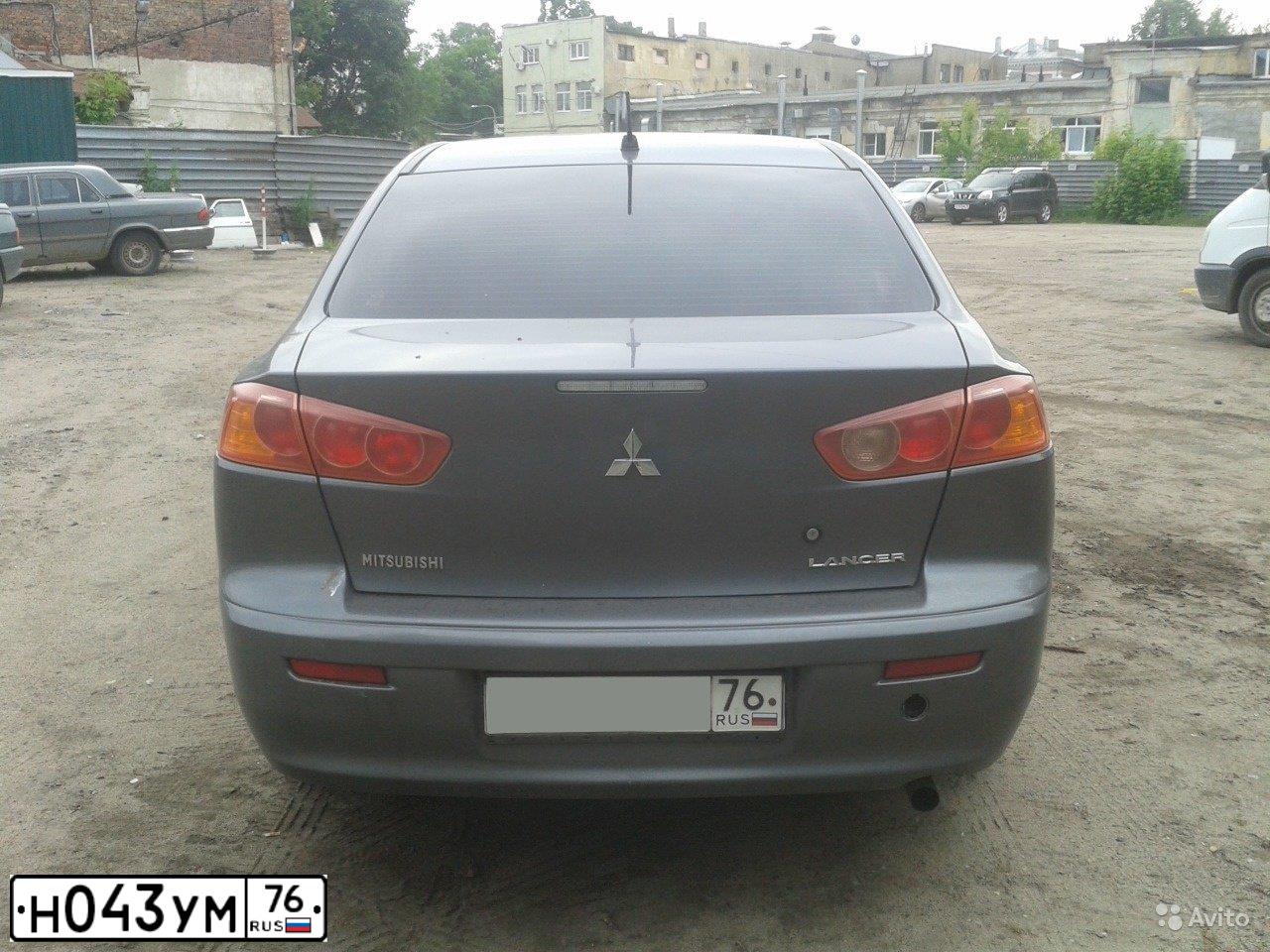 Фото автомобиля MITSUBISHI LANCER, 2008 — госномер О866КО76. Цвет: СЕРЫЙ