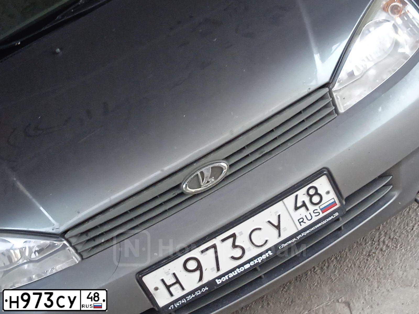 Фото автомобиля LADA 1117 KALINA, 2011 — госномер Н973СУ48. Цвет: ТЕМНО-СЕРЫЙ МЕТАЛЛИК
