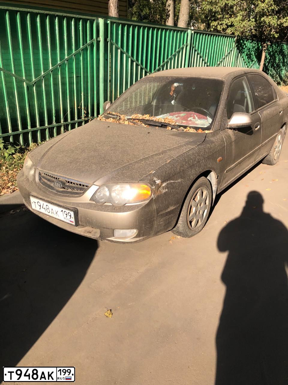 Фото автомобиля KIA SHUMA, 2004 — госномер Т948АК199. Цвет: ТЕМНО-БЕЖЕВЫЙ