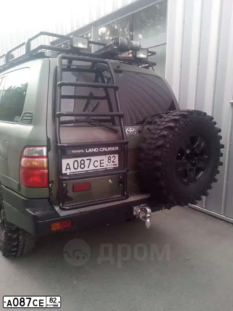 Фото автомобиля TOYOTA LANDCRUISER, 2002 — госномер А087СЕ82. Цвет: ЗЕЛЕНЫЙ