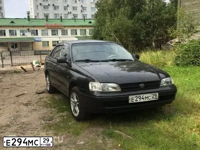 Фото автомобиля TOYOTA CARINA, 1996 — госномер М216РТ29. Цвет: ЧЕРНЫЙ